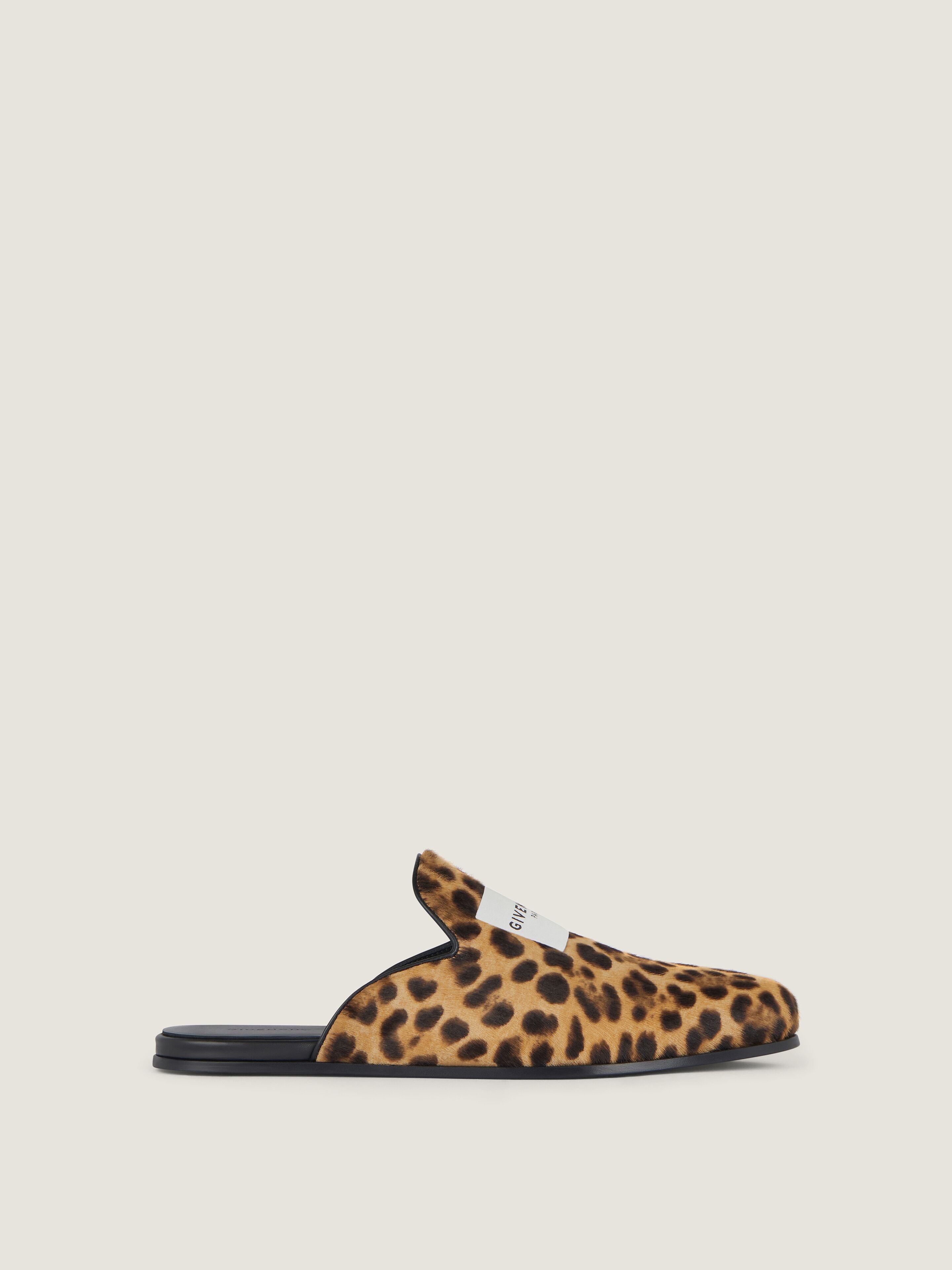 Label flat mules in pony effect leather with leopard pattern